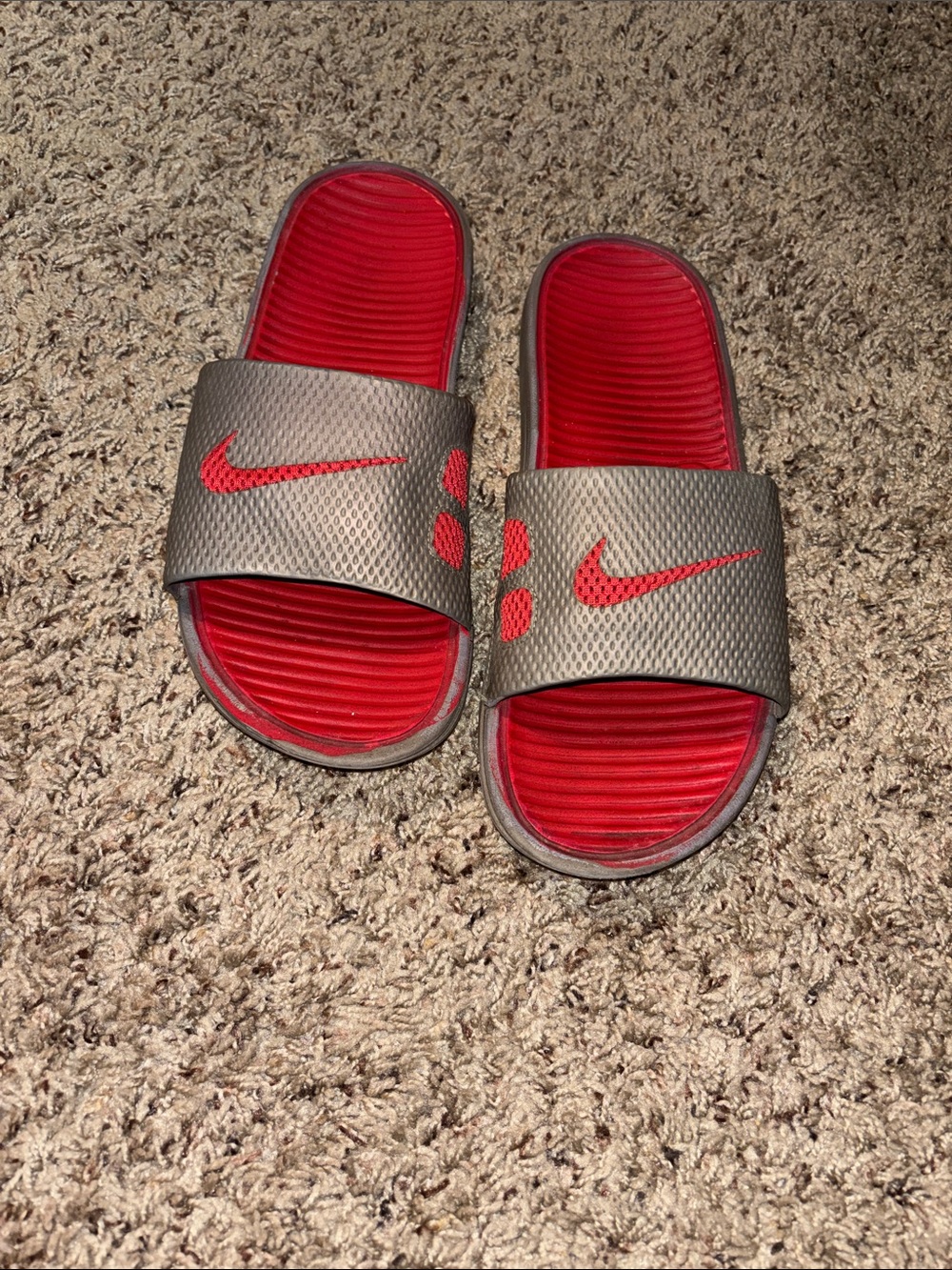 Nike Red and Gray Slide Sandals with Swoosh Accent